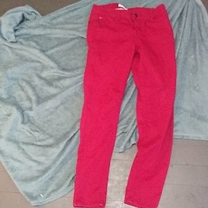 2 different color red jeans